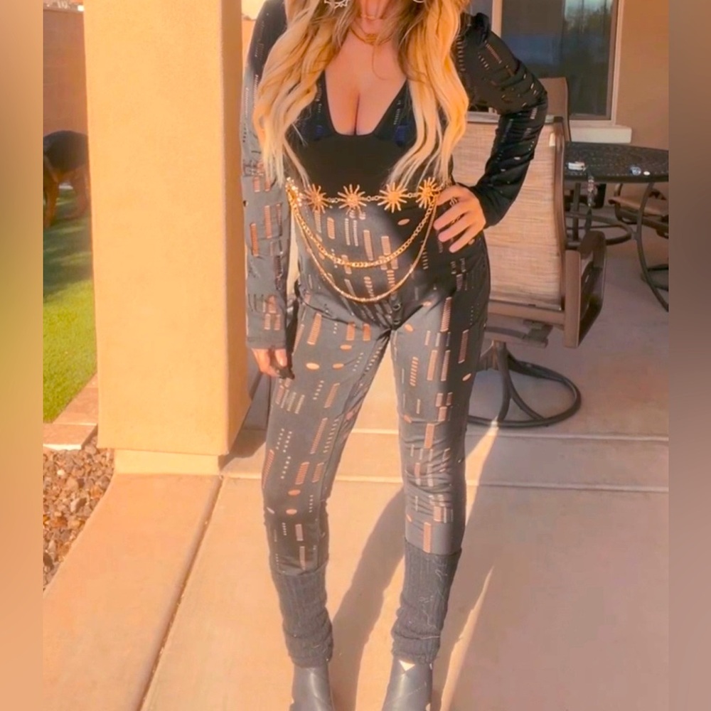 Boutique Cut Out Jumpsuit size L
